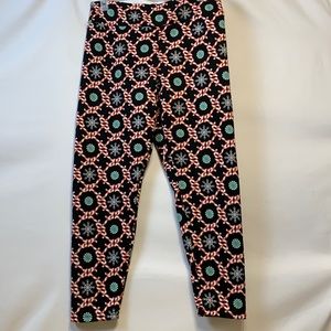 Holiday lined candy cane and candy print leggings